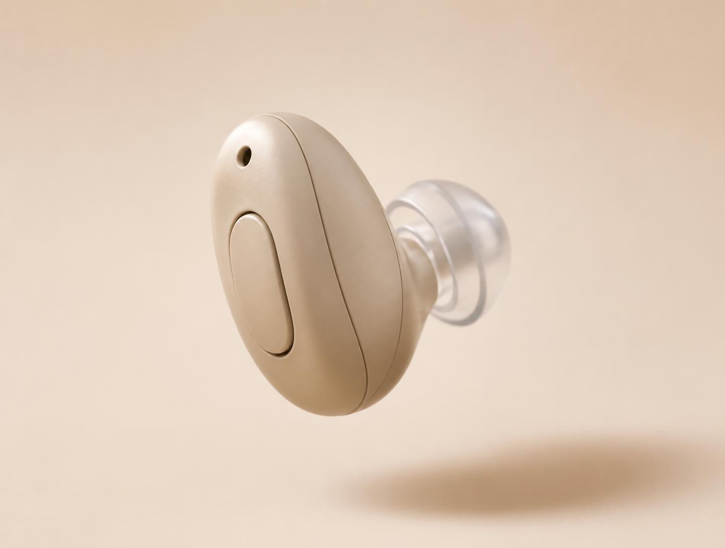 A discreet modern hearing device shown in close detail