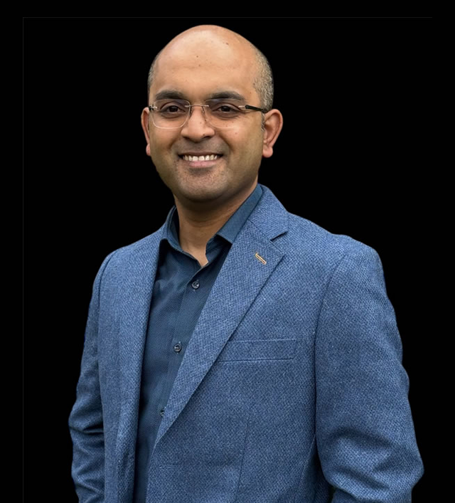 Portrait of Dr Kartik Iyer, audiologist at Boutique Hearing Clinic